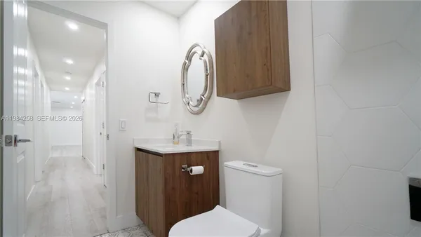 a bathroom with a sink a toilet and a bathtub