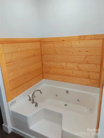 a bathroom with a bathtub