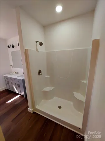 a bathroom with a bath tub