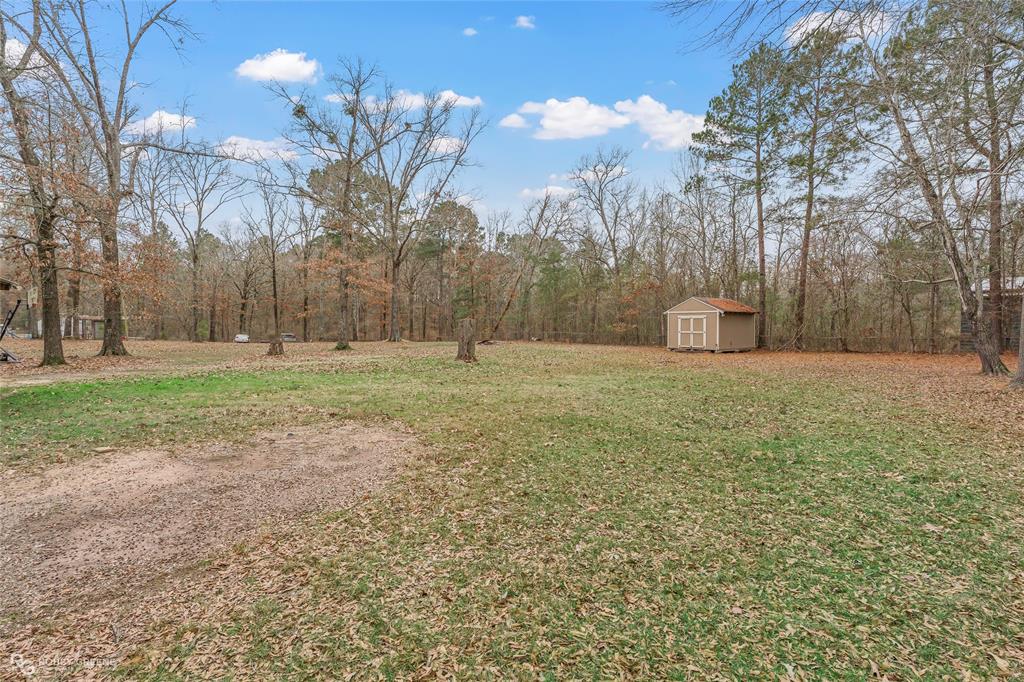158 Edwards Road Doyline, LA 71023 - Photo 24 of 28 a view of a field with trees