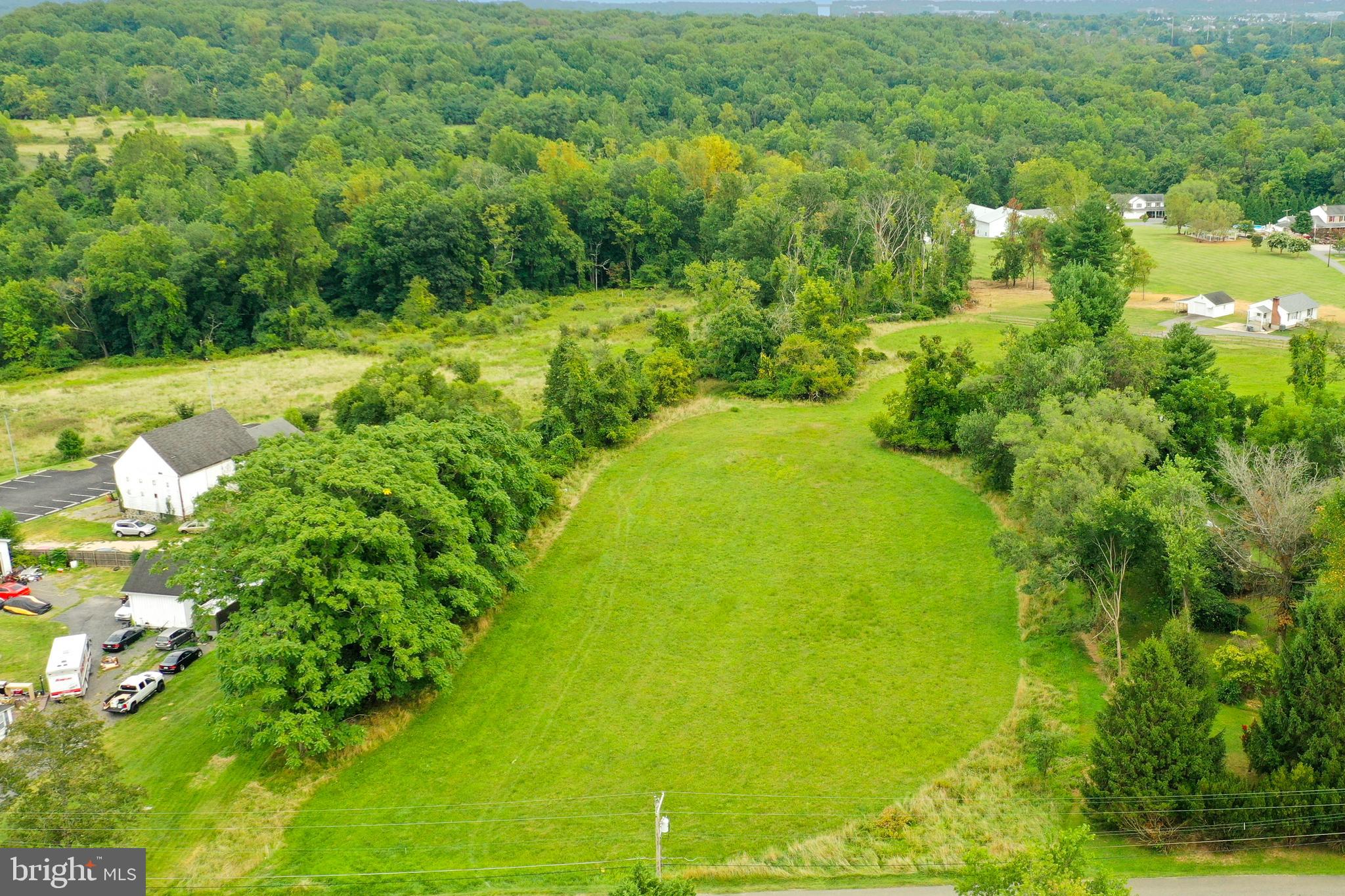 Rices Lane Windsor Mill, MD 21244 - Photo 22 of 22 a view of a garden with an outdoor space
