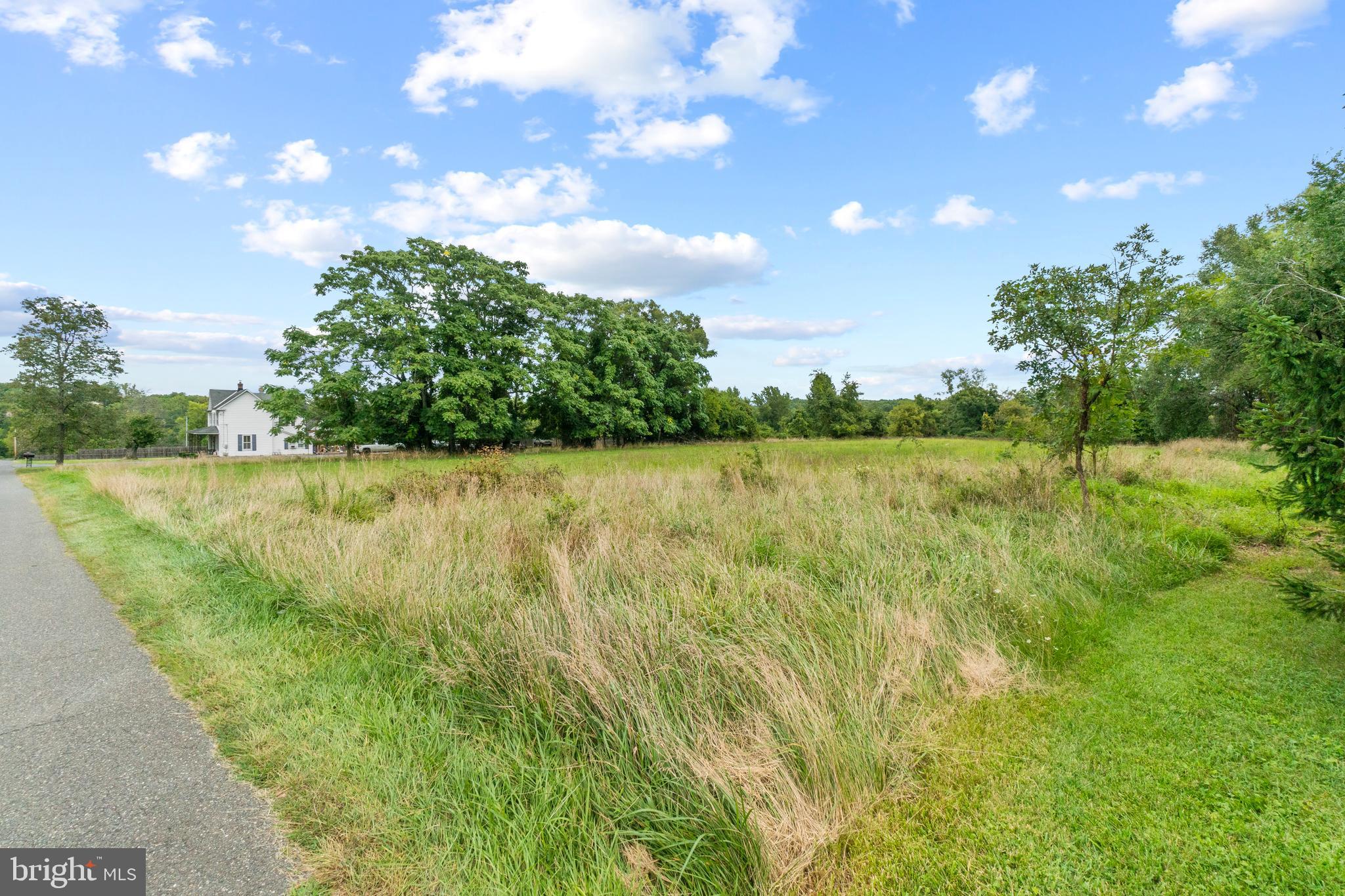 Rices Lane Windsor Mill, MD 21244 - Photo 6 of 22 a view of a lake with a yard