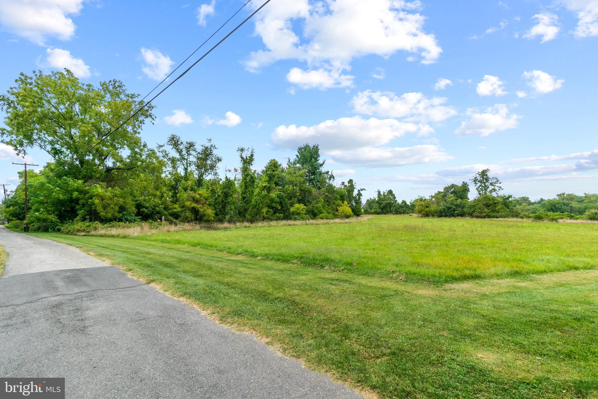 Rices Lane Windsor Mill, MD 21244 - Photo 7 of 22 a view of an outdoor space and yard