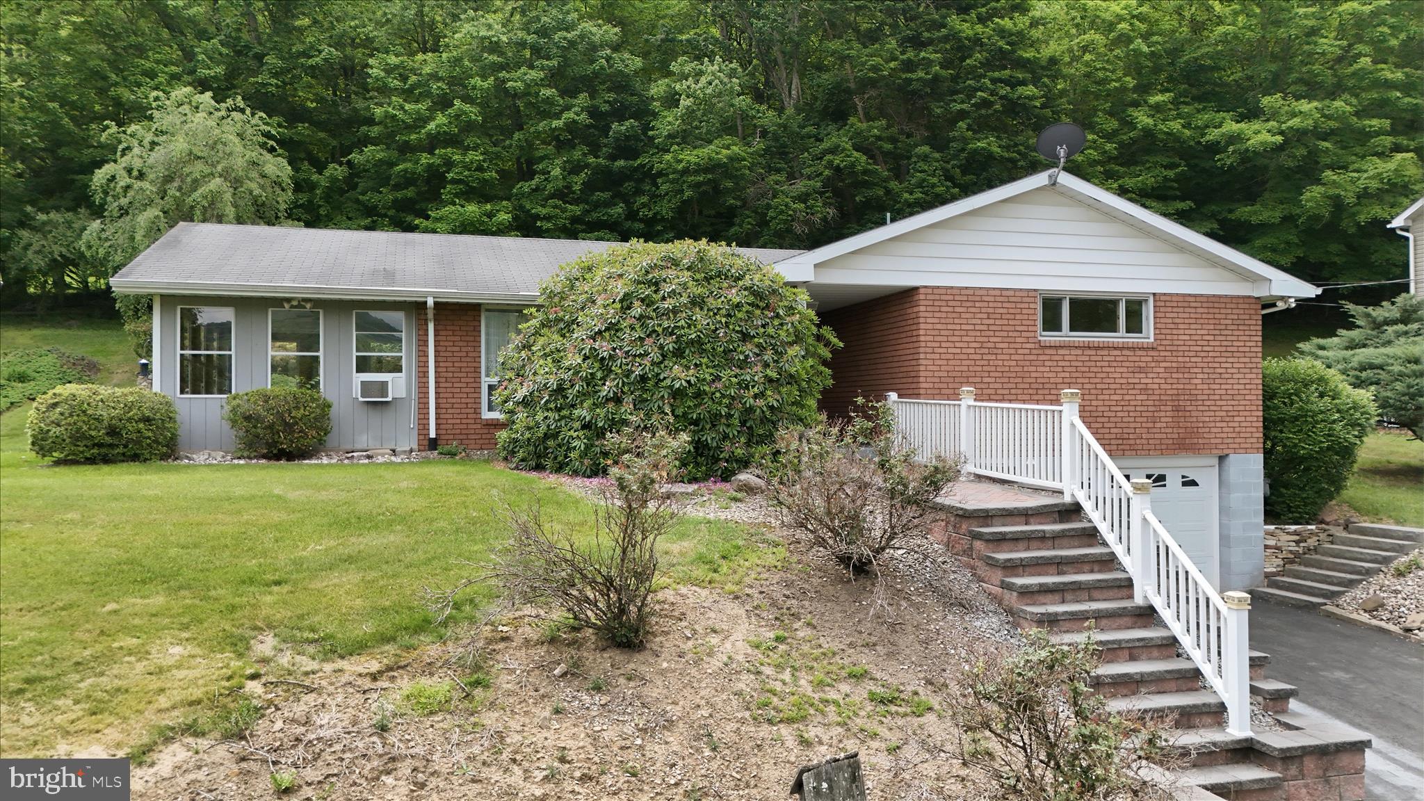 199 Buser Street Ridgeley, WV 26753 - Photo 3 of 49 front view of a house with a yard