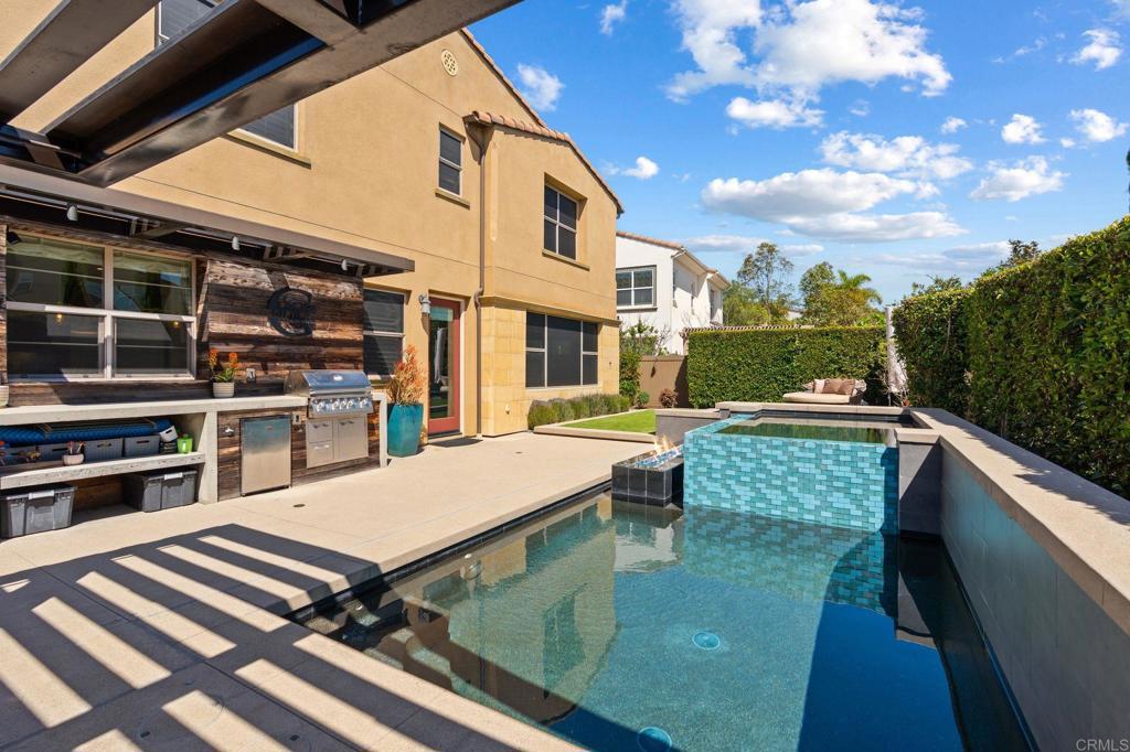 809 Dolphin Circle Encinitas, CA 92024 - Photo 55 of 71 a view of a balcony with chair and table