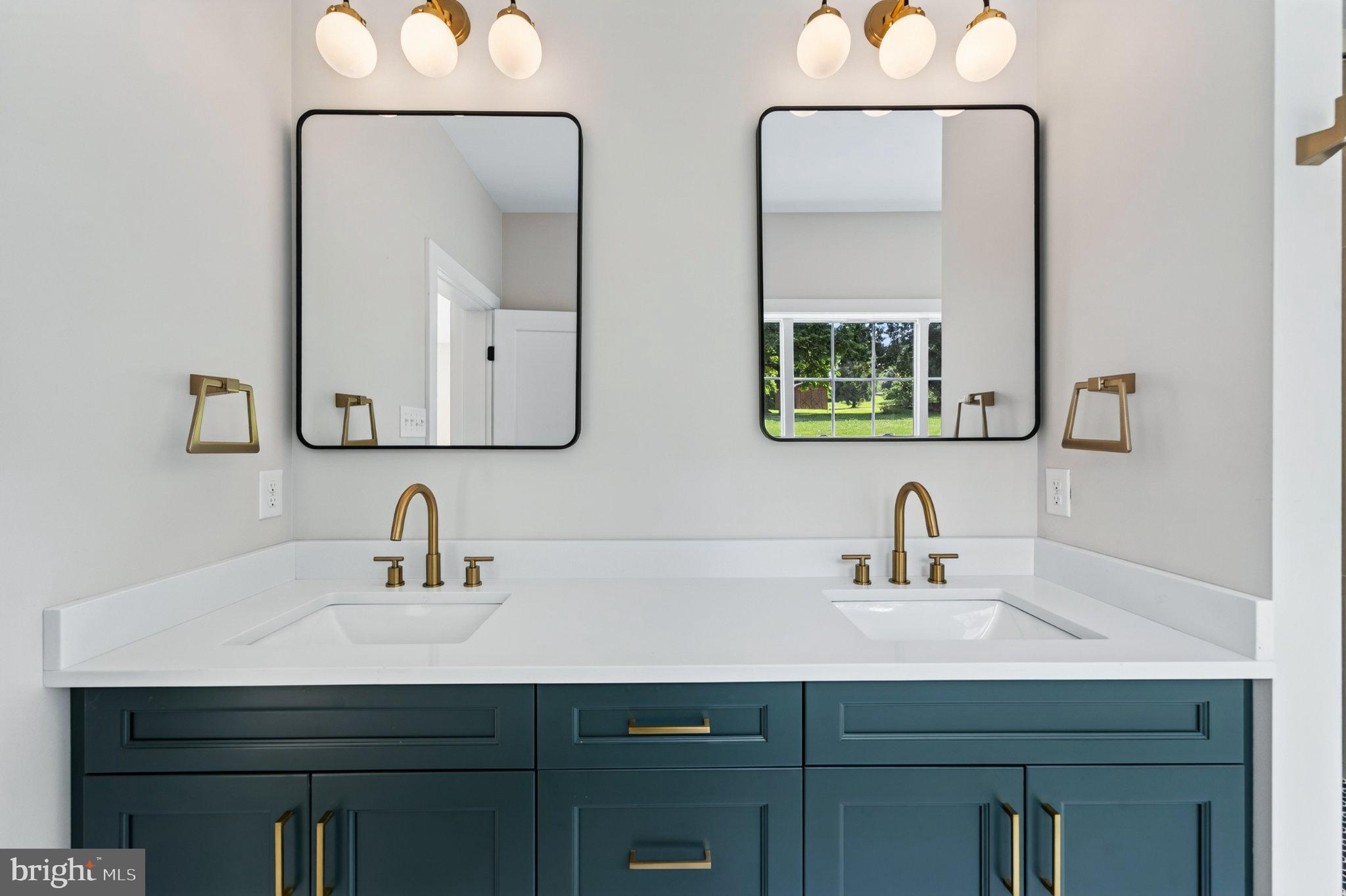 2069 Dutton Mill Road Newtown Square, PA 19073 - Photo 20 of 70 Elegant dual-sink bathroom oasis.