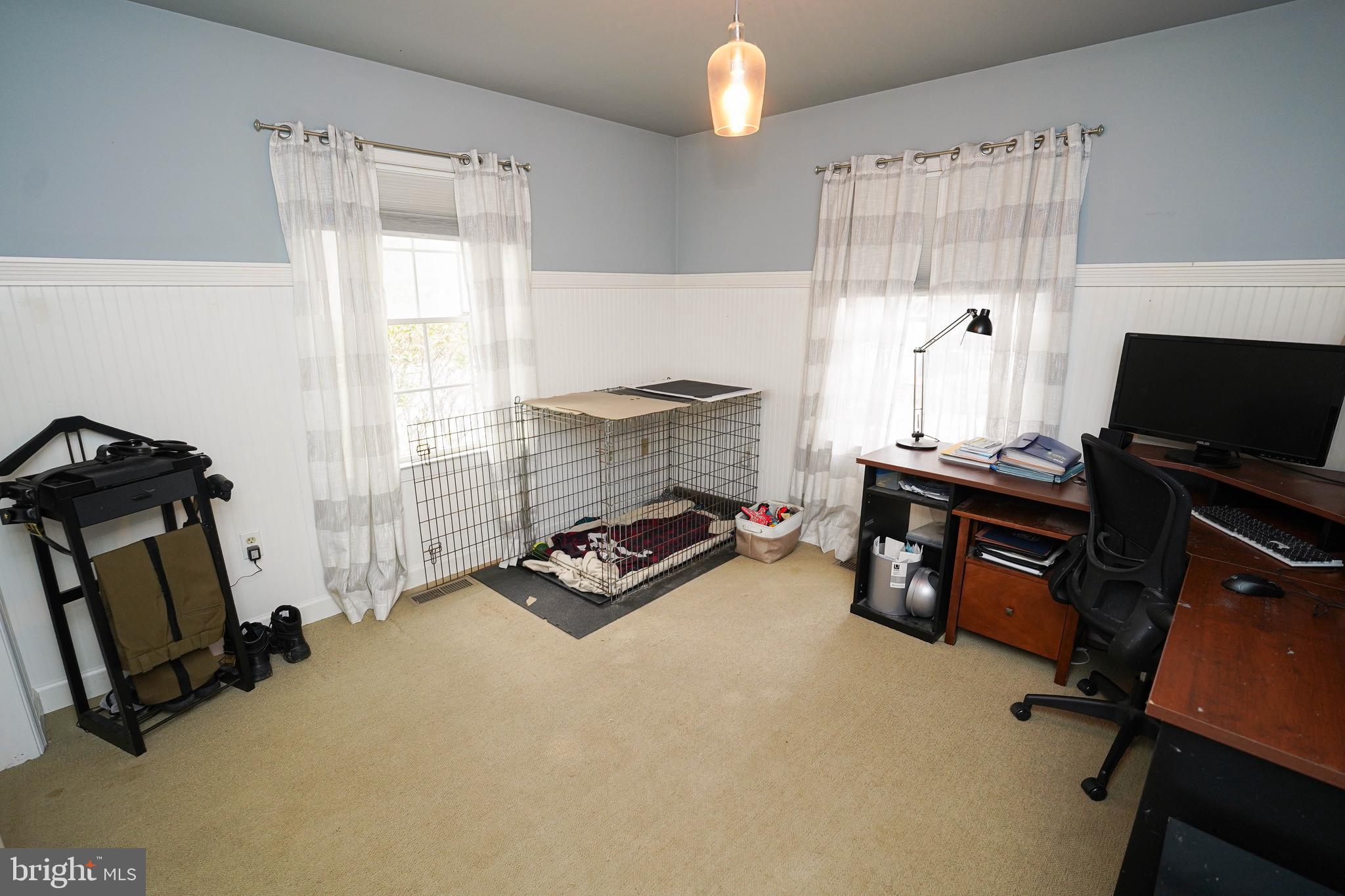 3727 Village Trail Snow Hill, MD 21863 - Photo 13 of 75 a room with furniture a flat screen tv and gym equipment