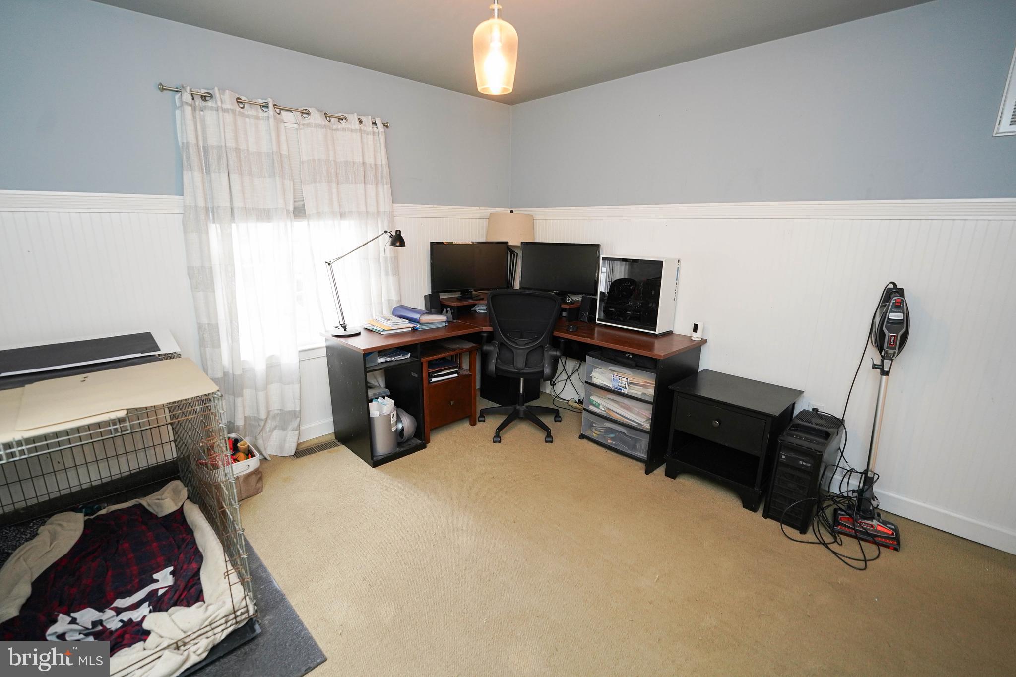 3727 Village Trail Snow Hill, MD 21863 - Photo 14 of 75 a view of a workspace with furniture and a window