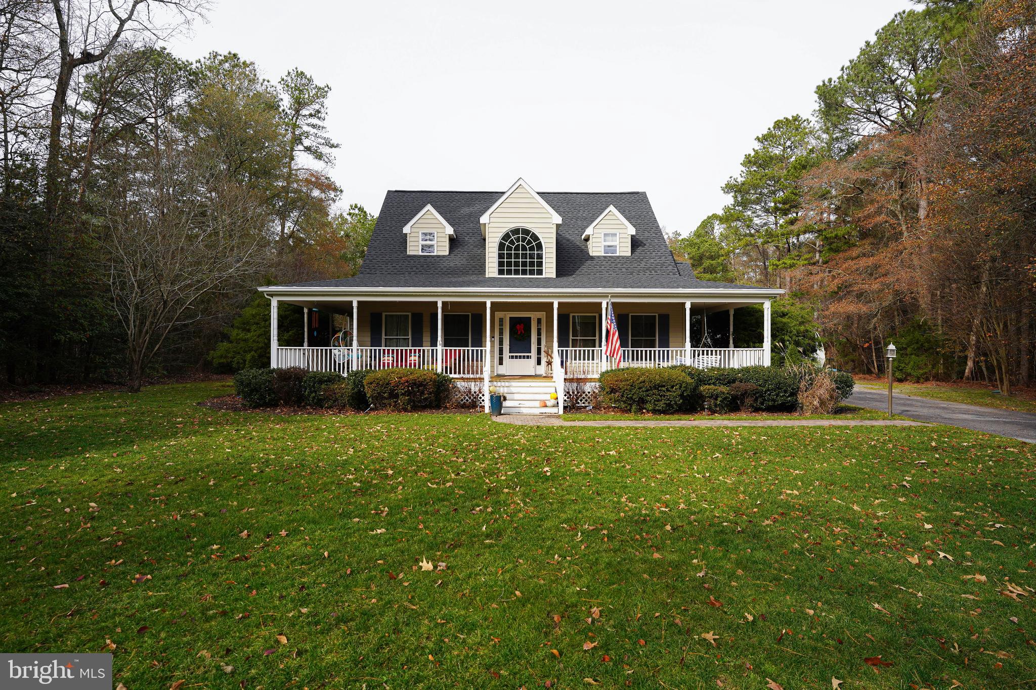 3727 Village Trail Snow Hill, MD 21863 - Photo 2 of 75 a front view of a house with a yard
