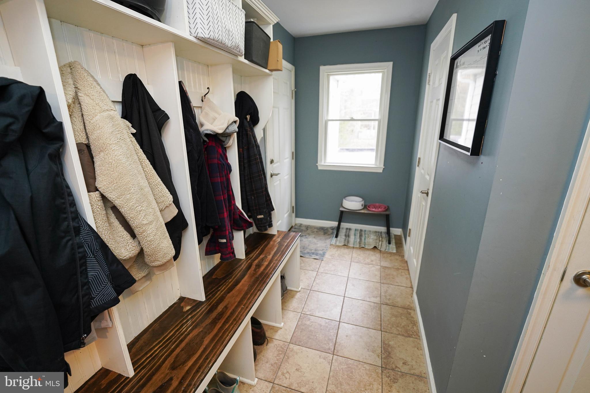 3727 Village Trail Snow Hill, MD 21863 - Photo 25 of 75 a view of walk in closet with clothes and shoes