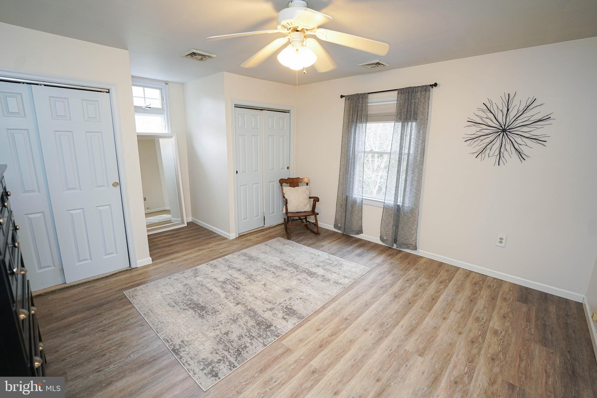 3727 Village Trail Snow Hill, MD 21863 - Photo 54 of 75 wooden floor in an empty room with a window