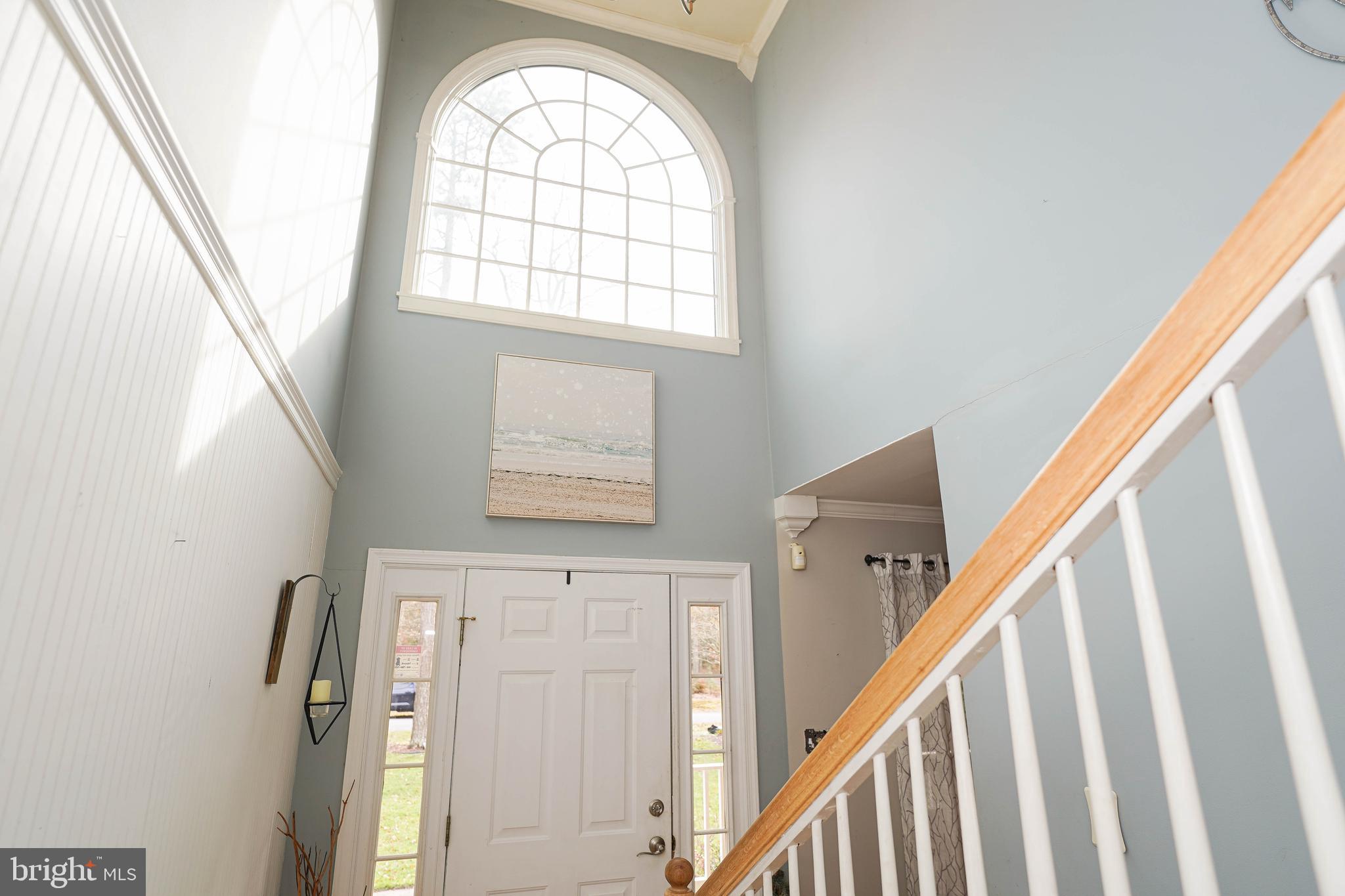 3727 Village Trail Snow Hill, MD 21863 - Photo 6 of 75 a view of an entryway with wooden floor