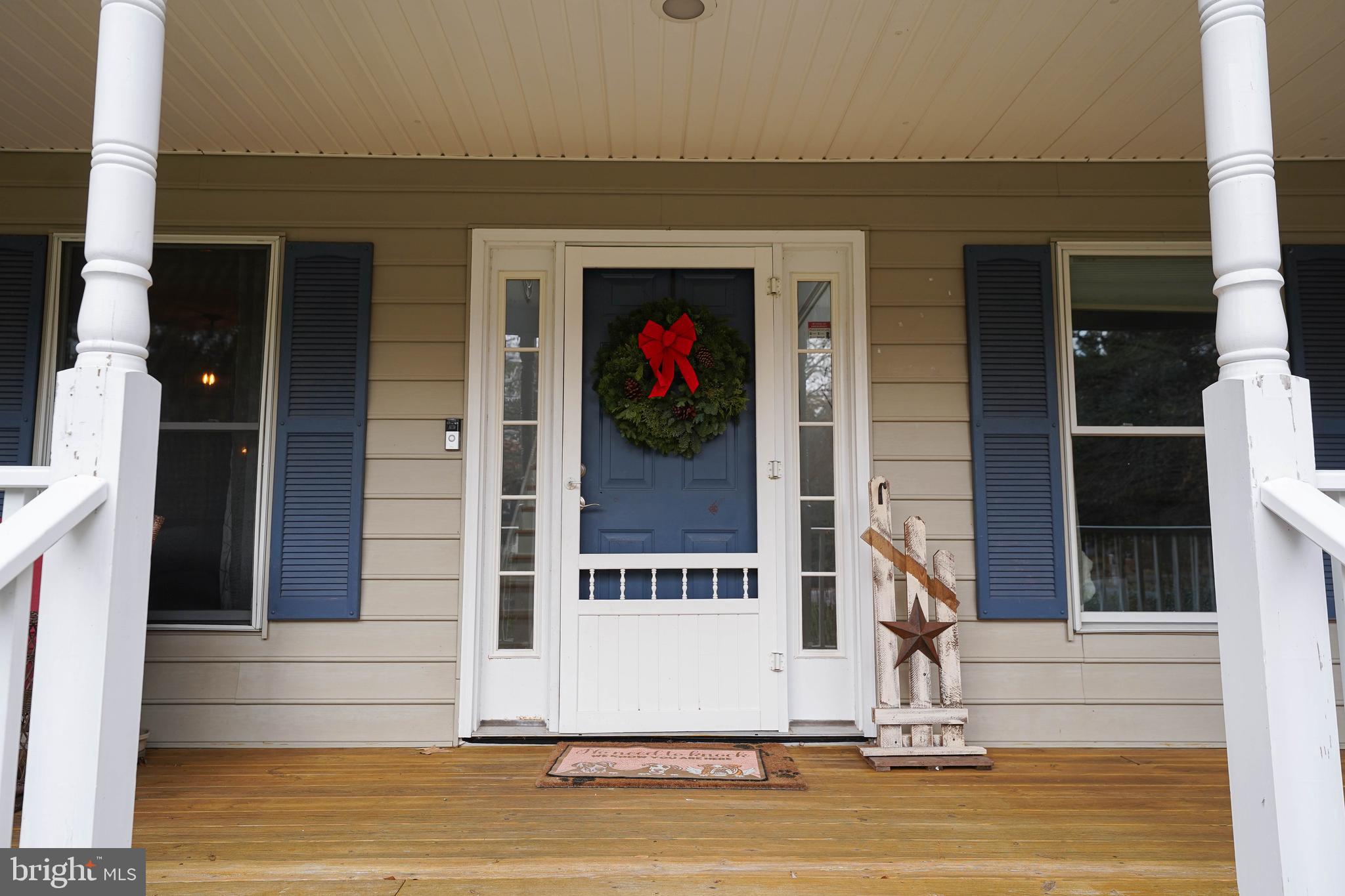 3727 Village Trail Snow Hill, MD 21863 - Photo 62 of 75 a view of a house with a door and a window