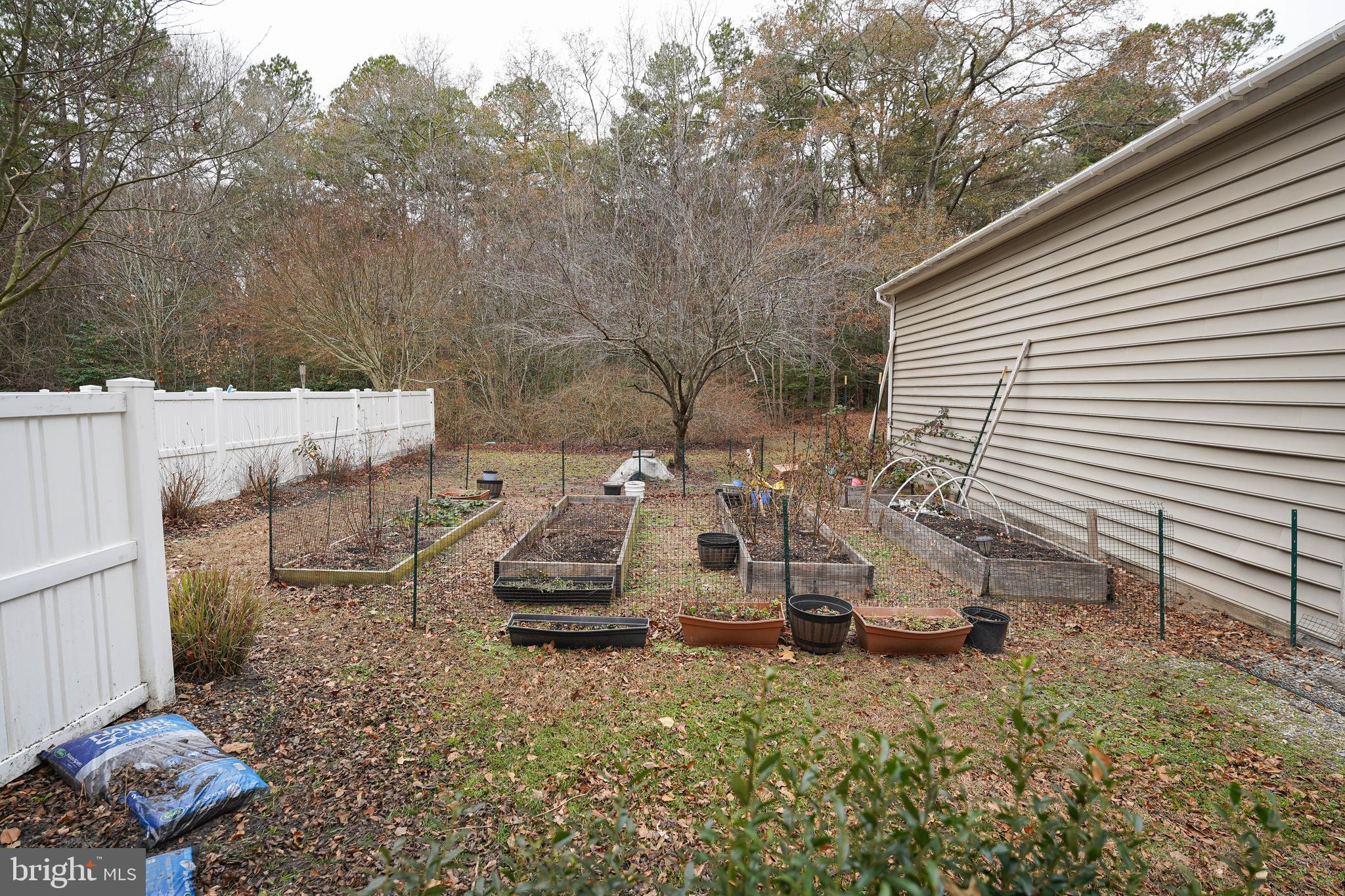 3727 Village Trail Snow Hill, MD 21863 - Photo 67 of 75 a view of backyard with outdoor seating