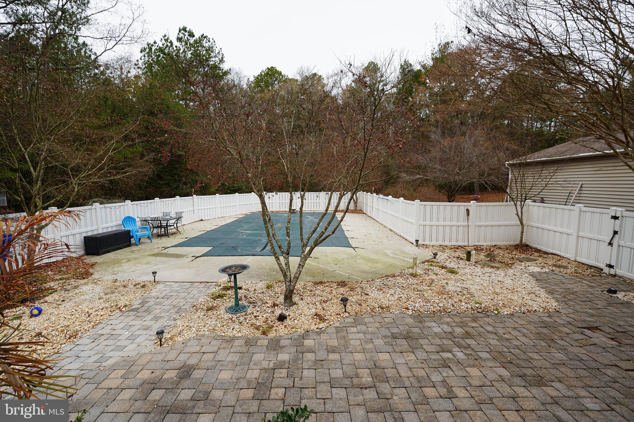 3727 Village Trail Snow Hill, MD 21863 - Photo 74 of 75 a view of a dry yard with a tree