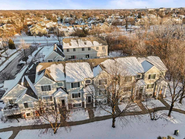 a view of a backyard with a snow