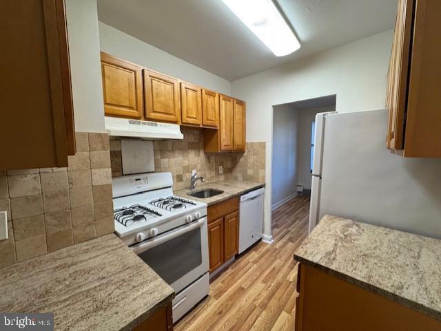 7900 Old York Road, Unit 510B Elkins Park, PA 19027 - Photo 11 of 21 a kitchen with stainless steel appliances granite countertop a stove a sink and a refrigerator