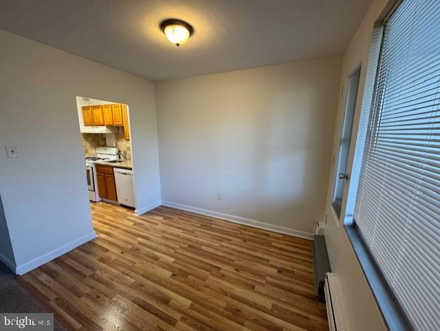 7900 Old York Road, Unit 510B Elkins Park, PA 19027 - Photo 12 of 21 a view of an empty room with wooden floor and a window