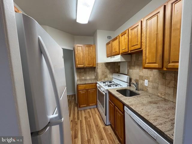 7900 Old York Road, Unit 510B Elkins Park, PA 19027 - Photo 10 of 21 a kitchen with a sink stove and refrigerator