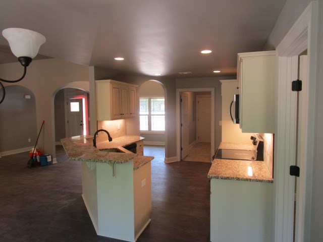 20 Poorhouse Road Seale, AL 36875 - Photo 4 of 19 a living room with furniture and a flat screen tv