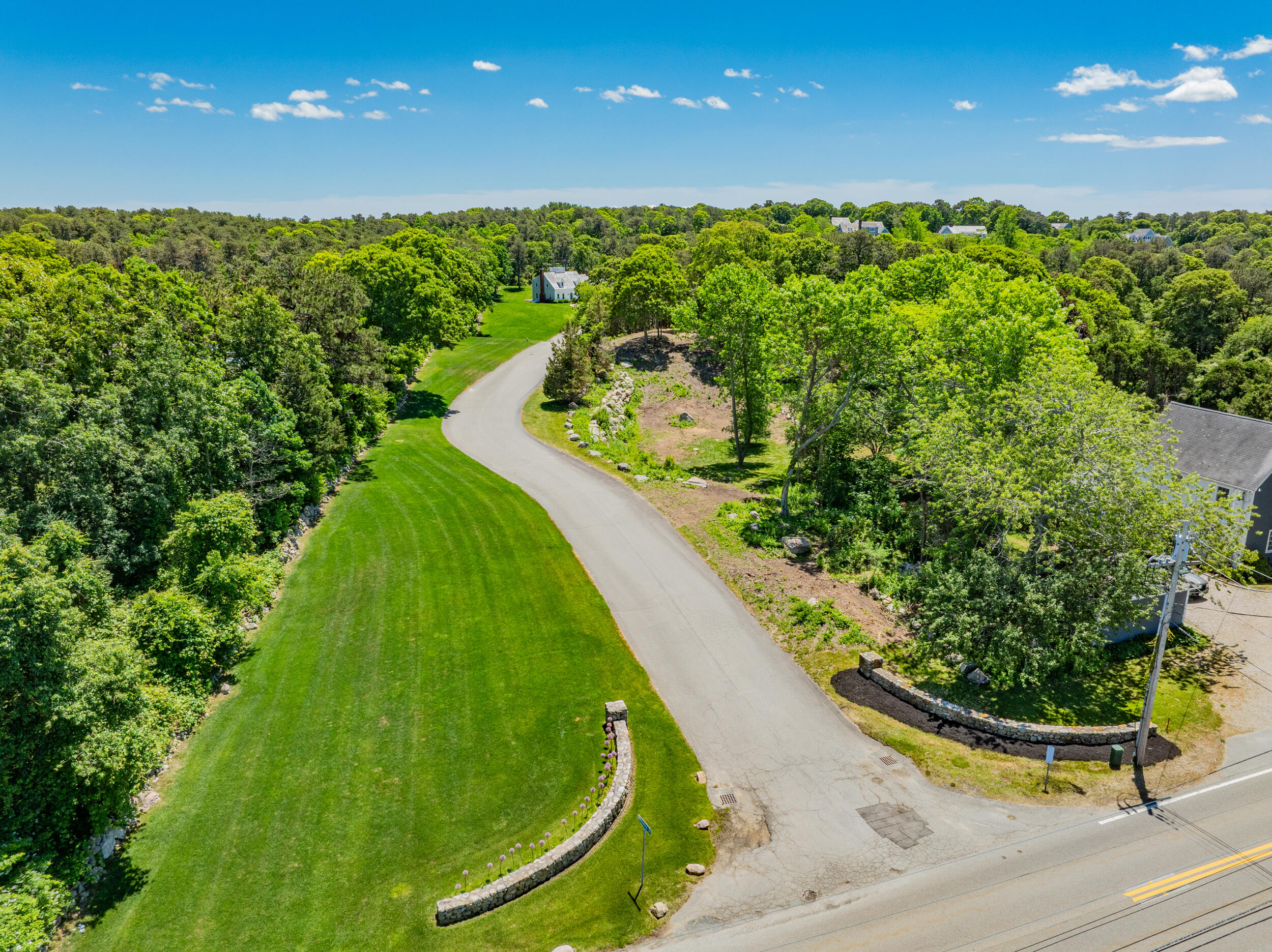 0 Ridgewood Drive Brewster, MA 02631 - Photo 38 of 42 a view of a big yard with potted plants