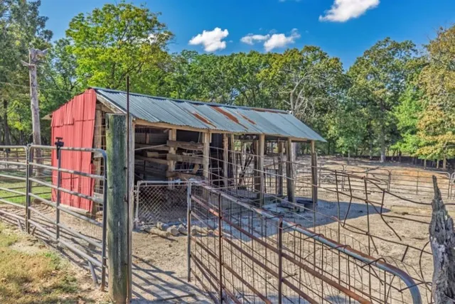a patio with table and chairs