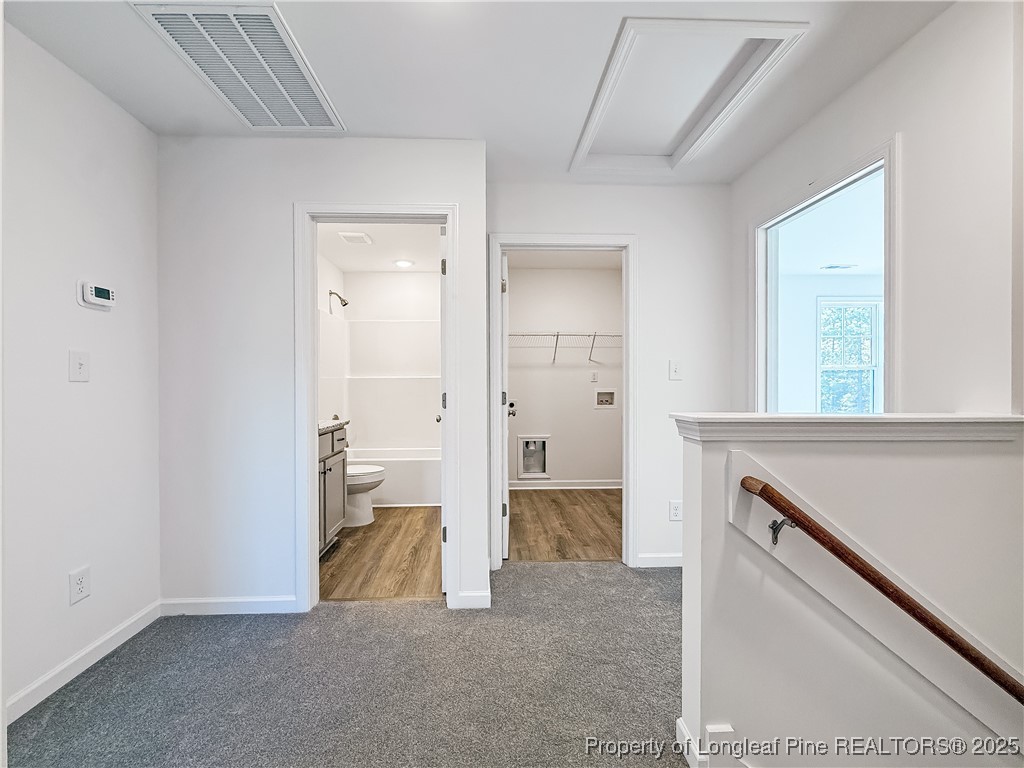 1020 Alex Baker (lot 9) Road Raeford, NC 28376 - Photo 17 of 31 a view of a hallway with bathroom and a livingroom