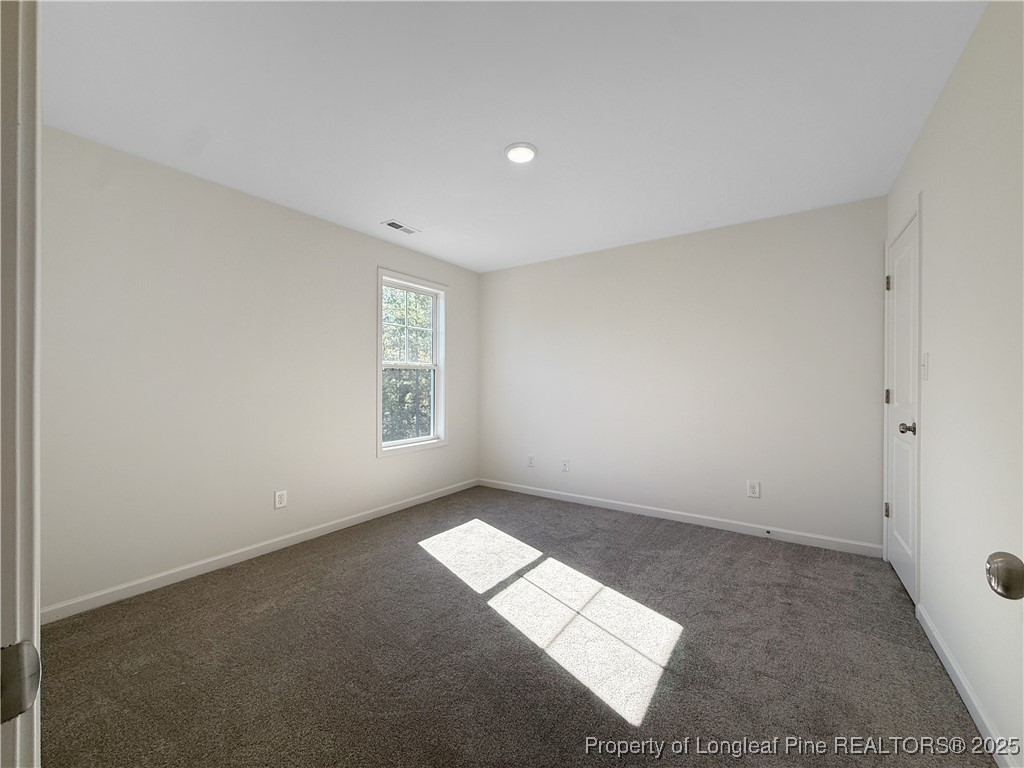 1020 Alex Baker (lot 9) Road Raeford, NC 28376 - Photo 20 of 31 an empty room with windows