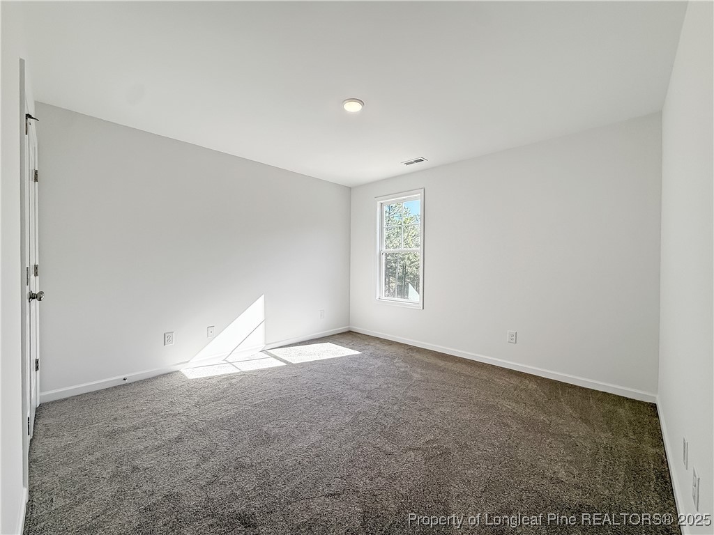 1020 Alex Baker (lot 9) Road Raeford, NC 28376 - Photo 22 of 31 an empty room with a window
