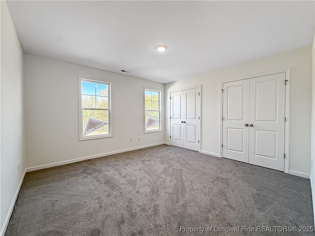 1020 Alex Baker (lot 9) Road Raeford, NC 28376 - Photo 23 of 31 an empty room with windows