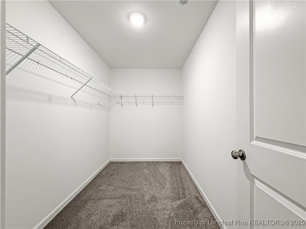 1020 Alex Baker (lot 9) Road Raeford, NC 28376 - Photo 30 of 31 a view of a room with racks on the wall