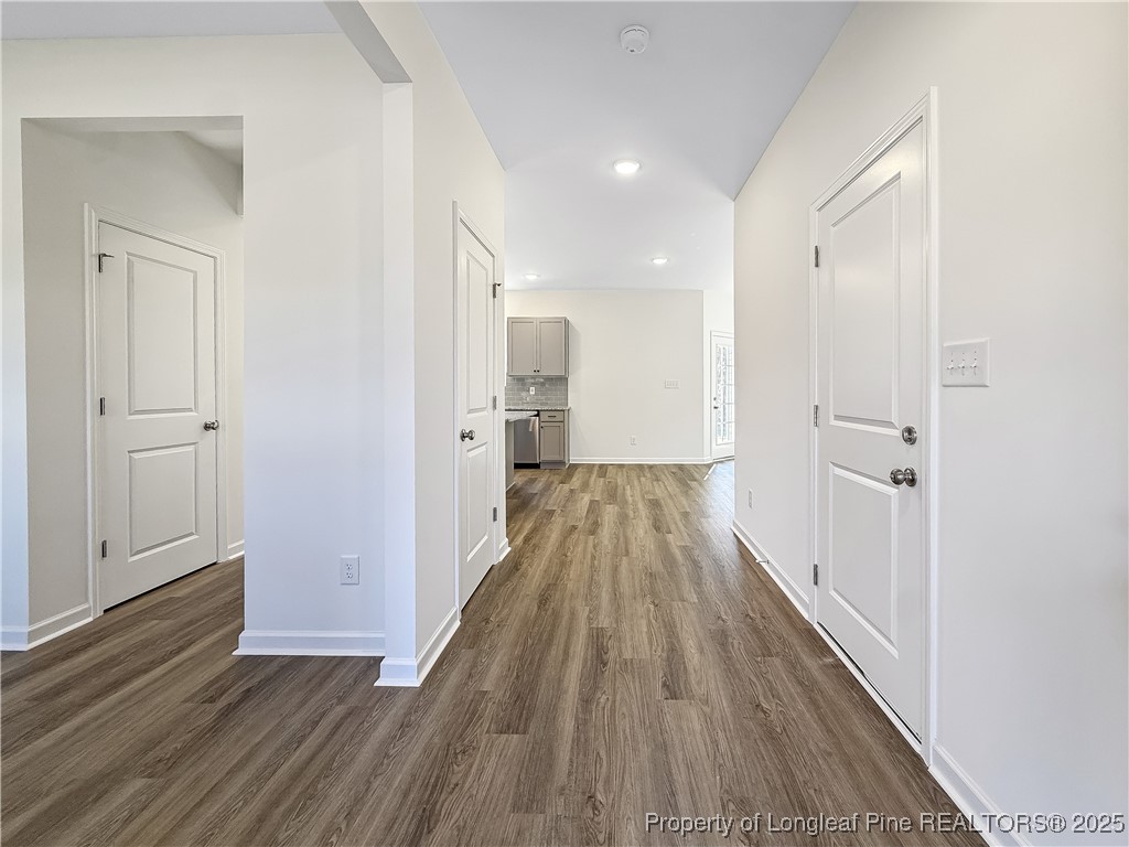 1020 Alex Baker (lot 9) Road Raeford, NC 28376 - Photo 3 of 31 a view of a hallway with wooden floor and staircase