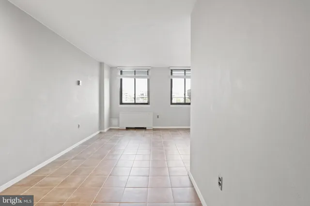 an empty room with windows