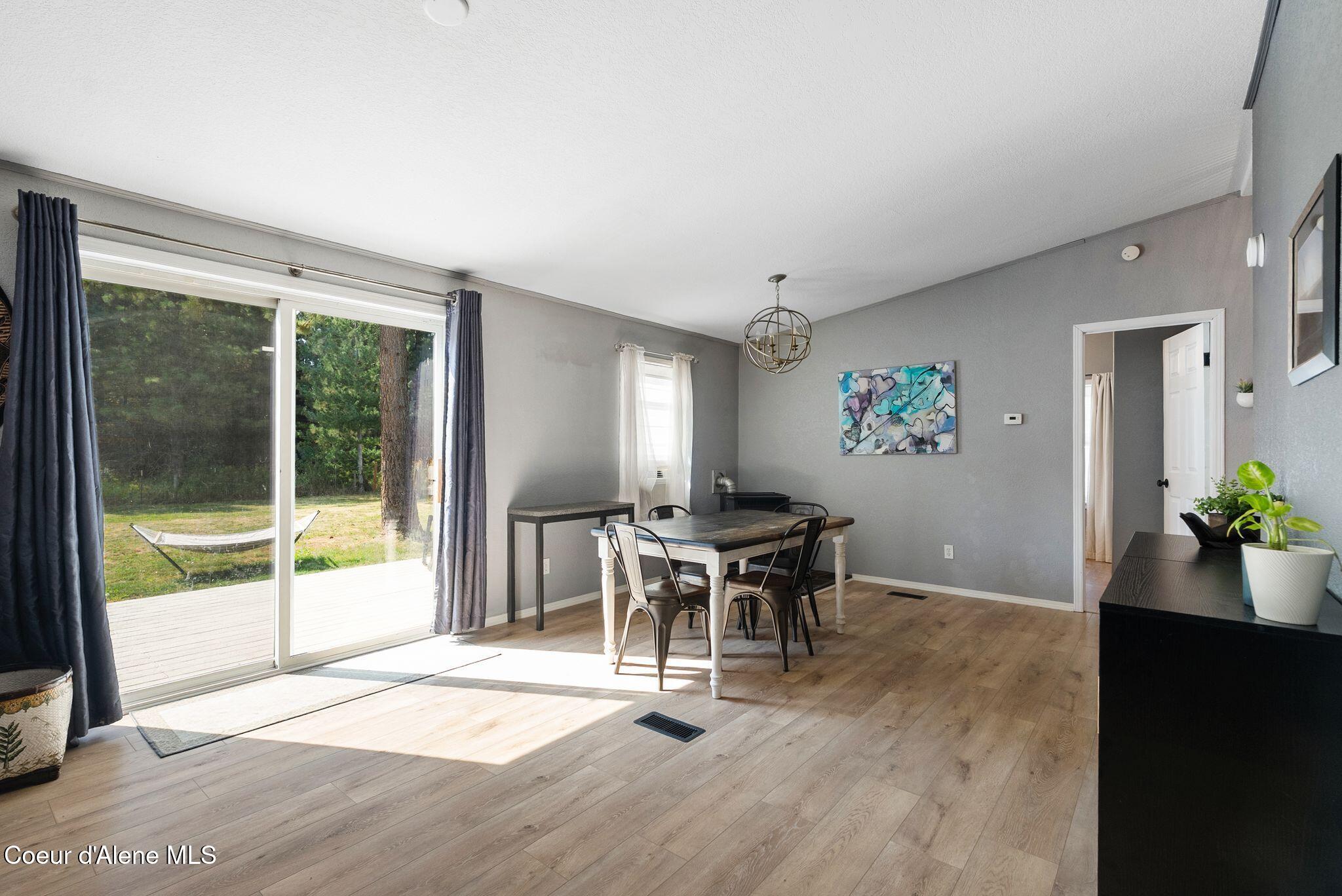120 Shelby Road Laclede, ID 83841 - Photo 12 of 41 Dining space with pellet stove