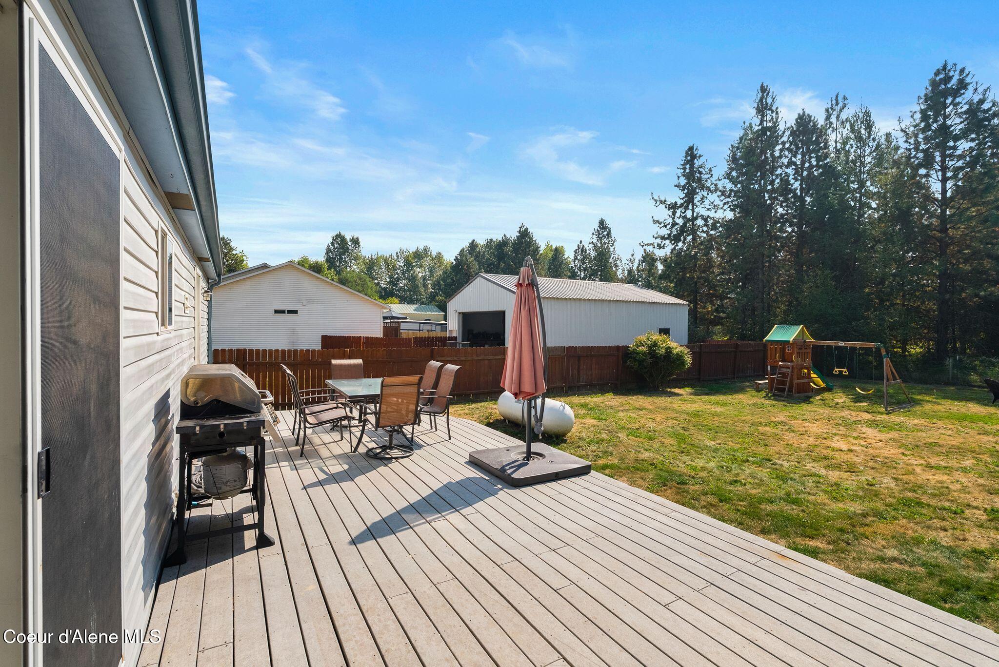 120 Shelby Road Laclede, ID 83841 - Photo 27 of 41 Outdoor living space with updated deck