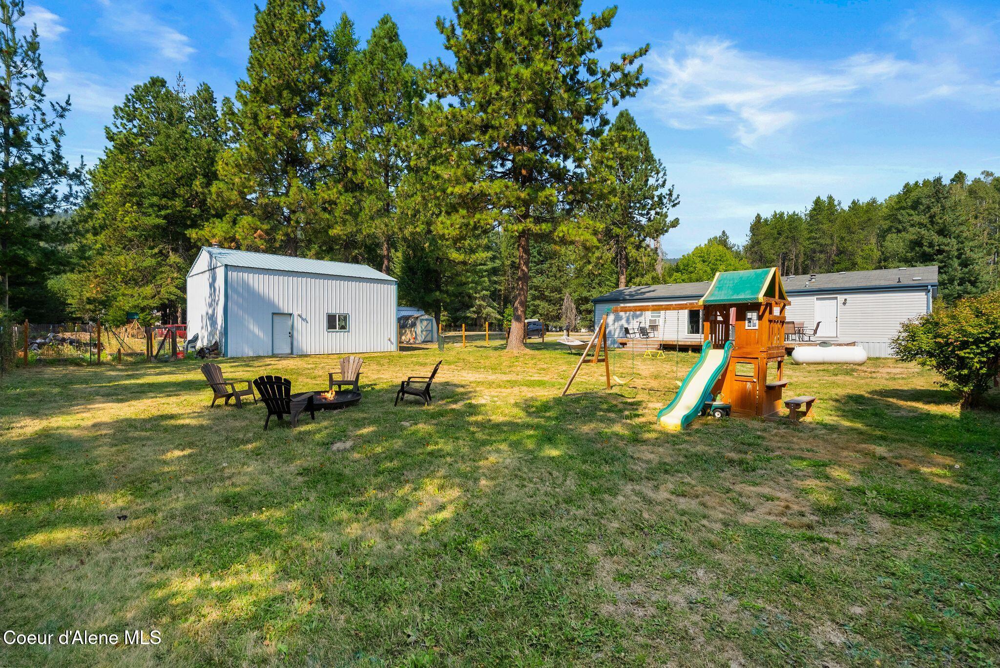 120 Shelby Road Laclede, ID 83841 - Photo 29 of 41 28_Built-in fire pit for outdoor enterta