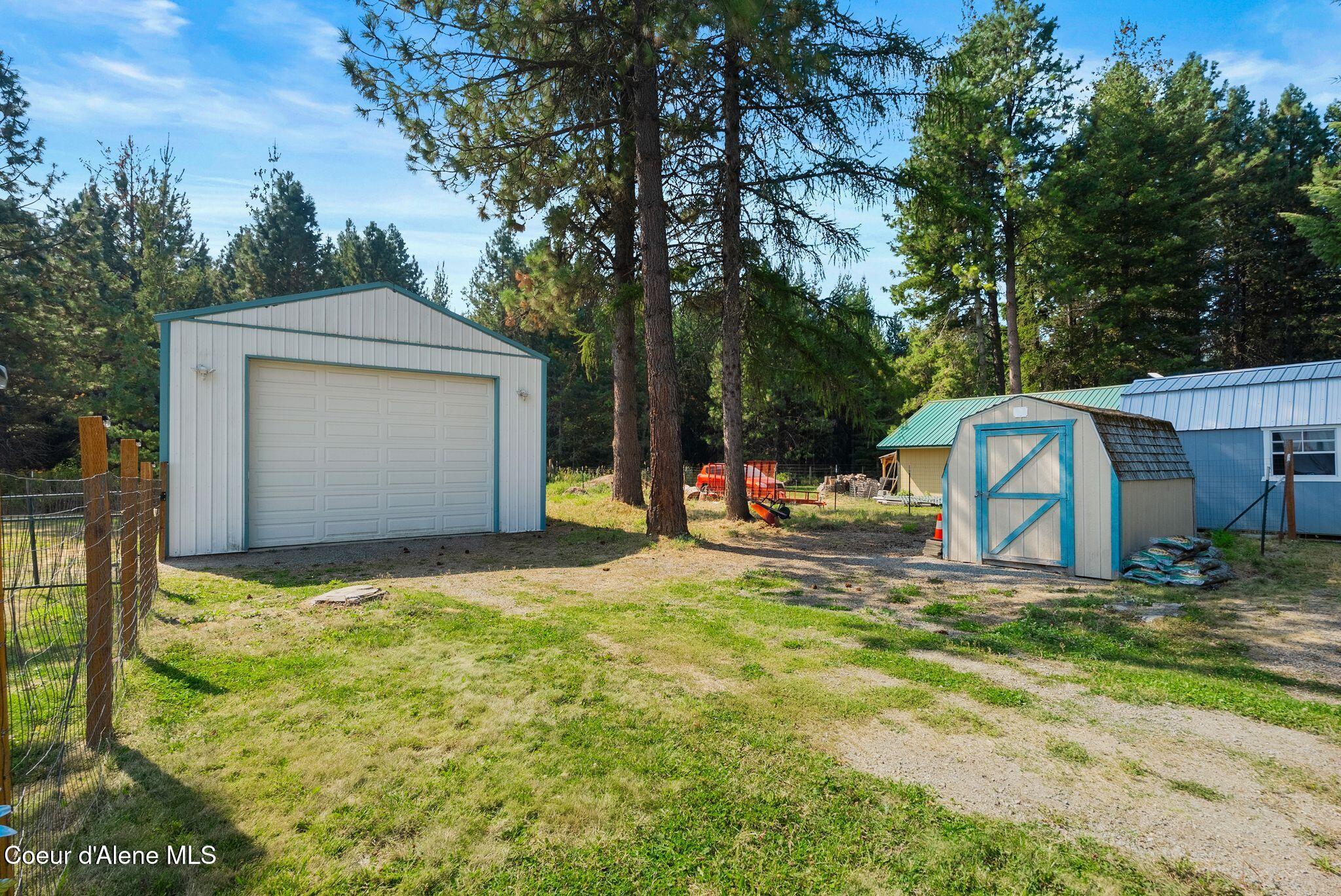 120 Shelby Road Laclede, ID 83841 - Photo 31 of 41 31_Additional parking and Storage shed a