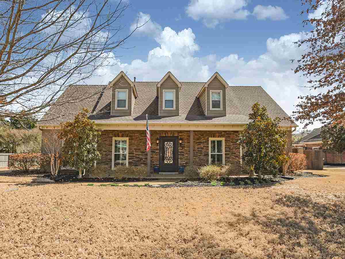 1714 John Ridge Drive Collierville, TN 38017 - Photo 1 of 23 A French exterior of brick and stone houses a fully renovated,beautifully maintained four(3 down) bedroom,plus bonus,three bath family home. An unbelievable 4 car garage(3rd and 4th heated and cooled not included in sq footage.) Amazing home!!