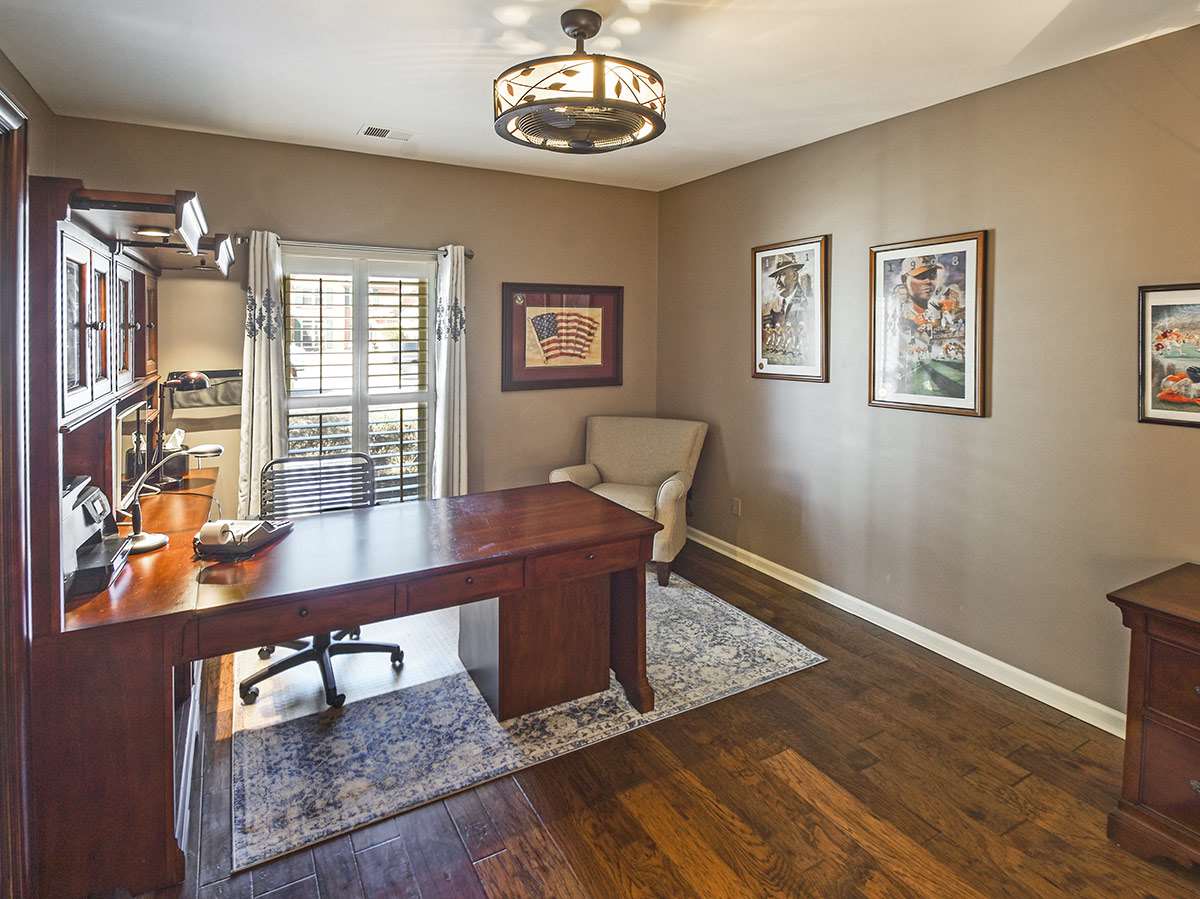 1714 John Ridge Drive Collierville, TN 38017 - Photo 14 of 23 Presently used as a home office,this spacious bedroom also has a walk-in closet and hardwood floors as seen throughout the downstairs living areas and bedrooms.
