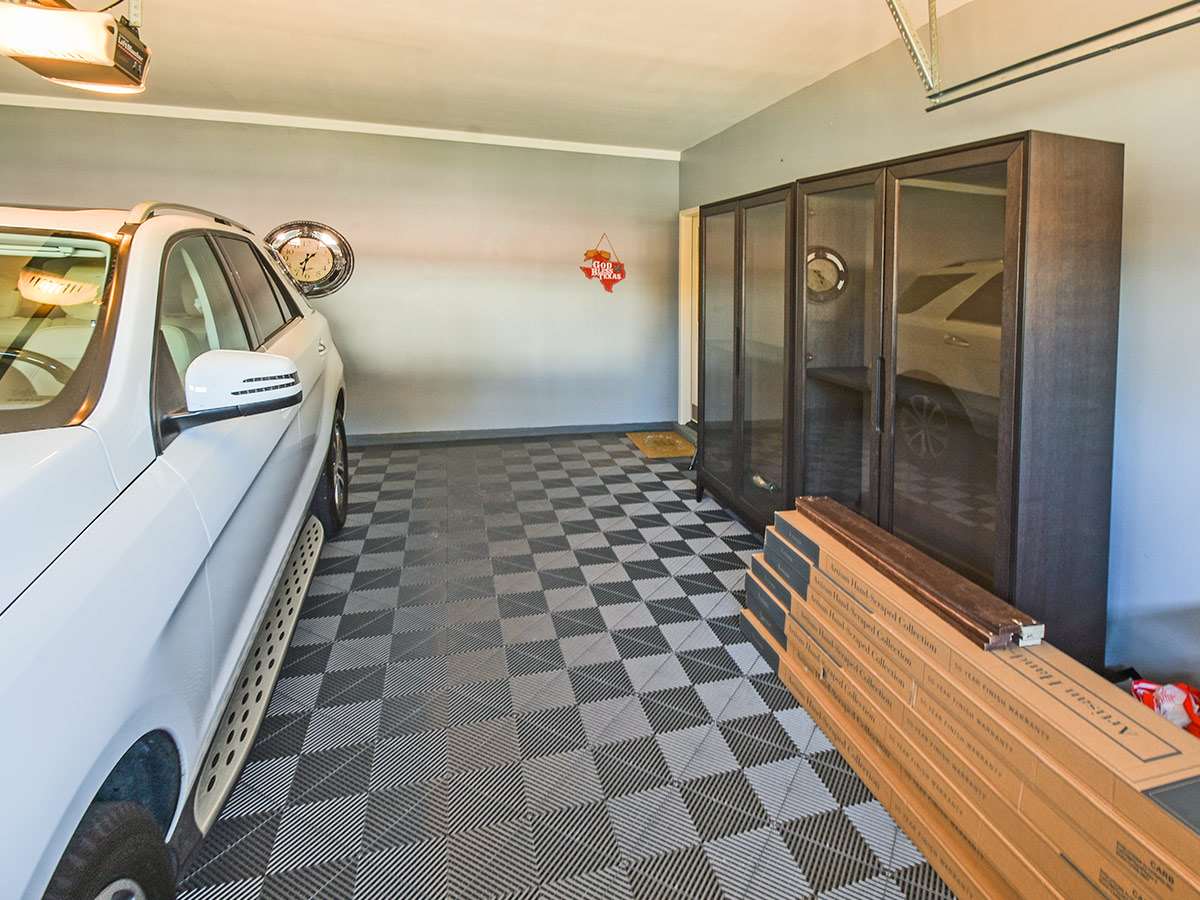 1714 John Ridge Drive Collierville, TN 38017 - Photo 23 of 23 Just had to show you the inside of the 2-car garage. These homeowners have thought of everything.