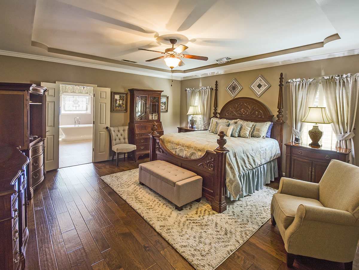 1714 John Ridge Drive Collierville, TN 38017 - Photo 10 of 23 This home has a rare 3 bedrooms downstairs floor plan. The primary bedroom is spacious(18x15 and features and ensuite bath.