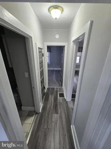 a view of staircase with white walls