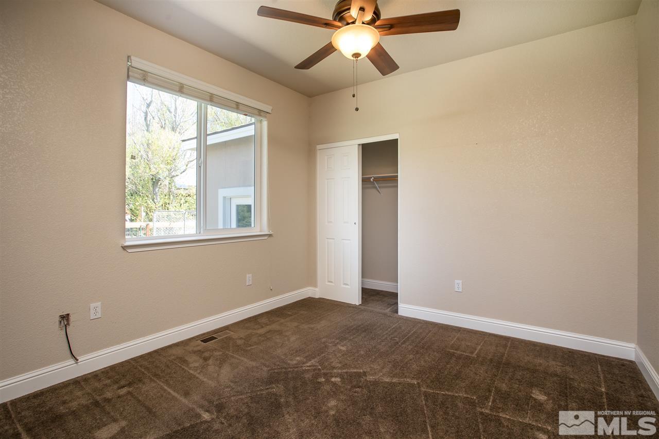 22925 Carriage Drive Reno, NV 89521 - Photo 20 of 24 a view of an empty room with a window