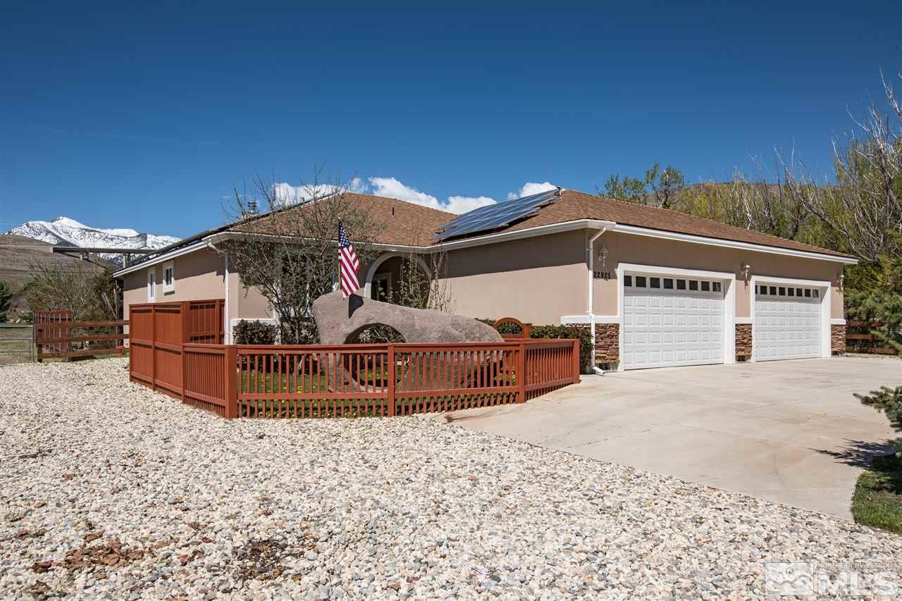 22925 Carriage Drive Reno, NV 89521 - Photo 6 of 24 a view of a house with a snow in the yard