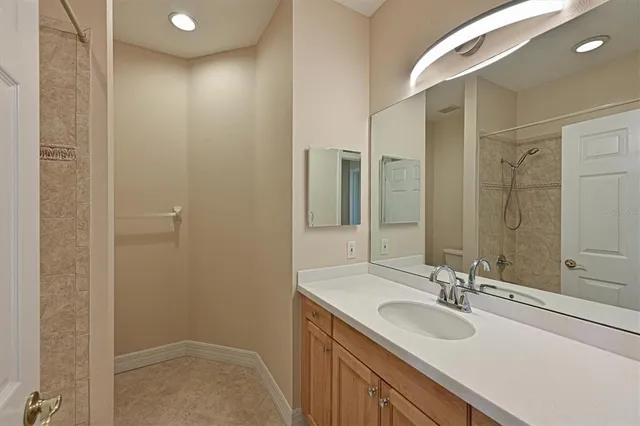 a bathroom with a sink double vanity and a mirror