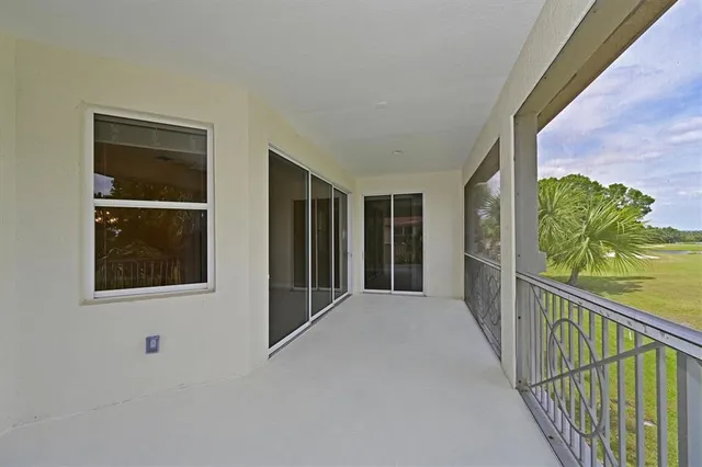 a view of a lake with a building in the background