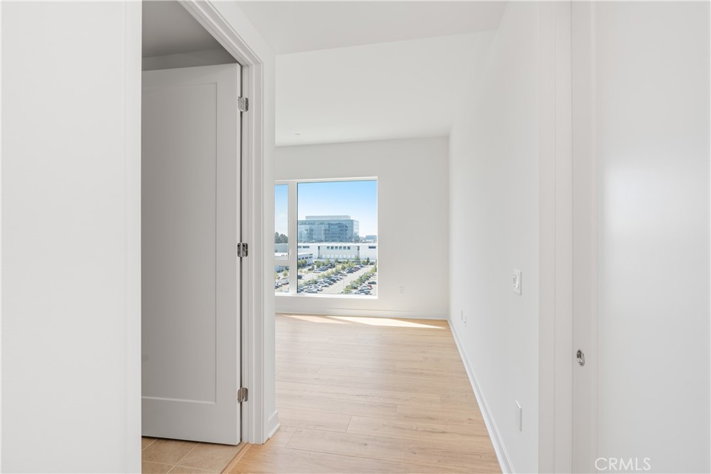 1601 Rivington Irvine, CA 92612 - Photo 20 of 29 a view of a hallway with wooden floor