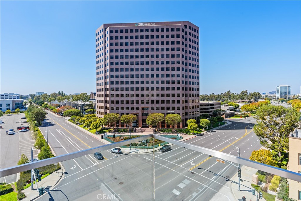 1601 Rivington Irvine, CA 92612 - Photo 29 of 29 a view of a balcony with two chairs and a potted plant