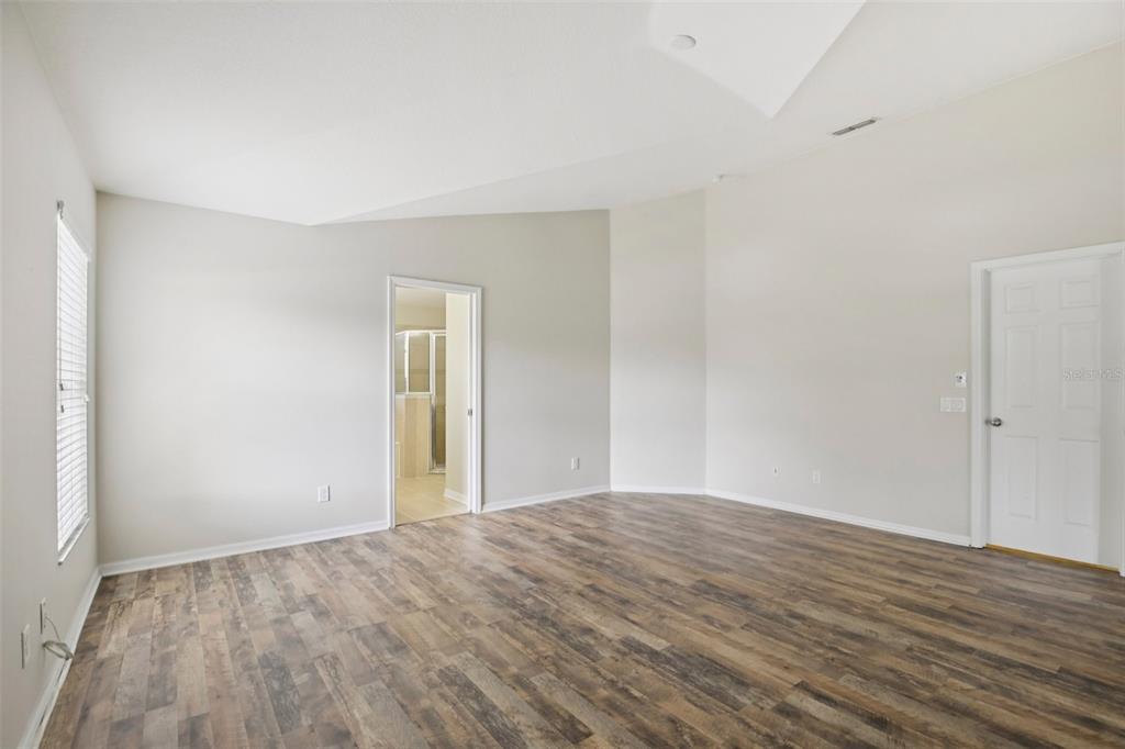 106 Star Shell Drive Apollo Beach, FL 33572 - Photo 25 of 33 a view of empty room with wooden floor