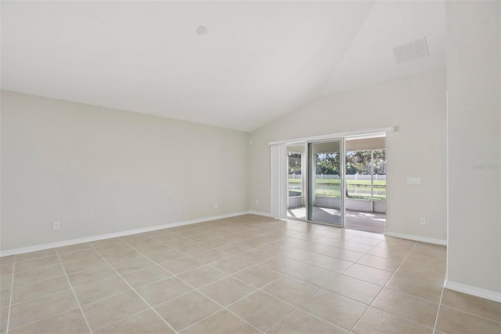 106 Star Shell Drive Apollo Beach, FL 33572 - Photo 7 of 33 an empty room with windows